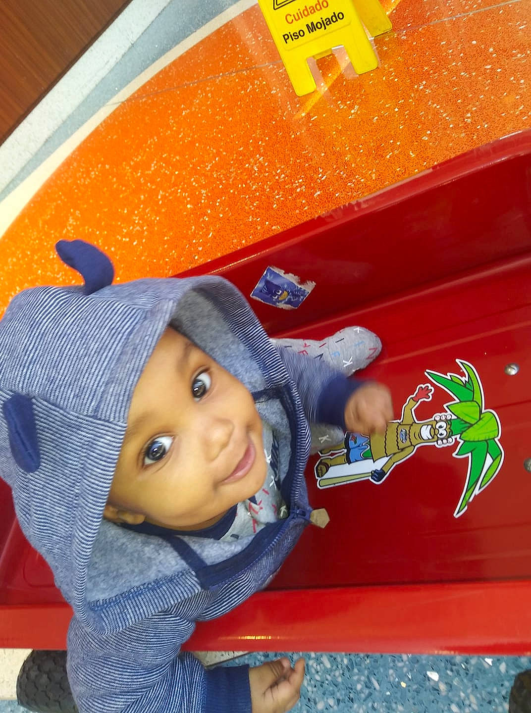 Damarion is registered to the contest to win money with this photo: baby, baby_toddler_clothing, headwear, hood, orange, person