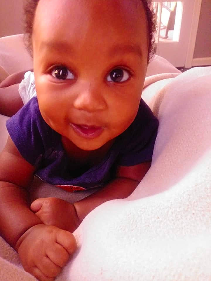 Damarion is registered to the contest to win money with this photo: baby_toddler_clothing, cheek, child, chin, comfort, eye, eyebrow, facial_expression, finger, forehead, happy, iris, lip, mouth, muscle, nose, organ, person, skin, toddler