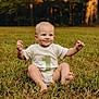 baby, child, grass, outdoor, nature, forest, onesie, smile, sitting, barefoot, happy, young, portrait, cute, infant, green, daylight, person, one, number