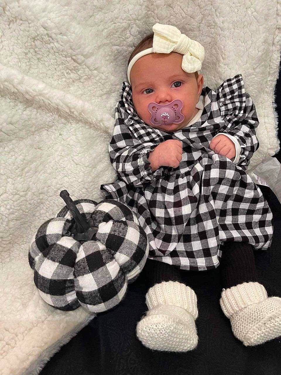 Journie is registered to the contest to win money with this photo: baby, baby_products, baby_sleeping, baby_toddler_clothing, baby_toys, cap, child, comfort, doll, head, linens, pattern, person, plaid, sitting, sleeve, tartan, textile, toddler, toy