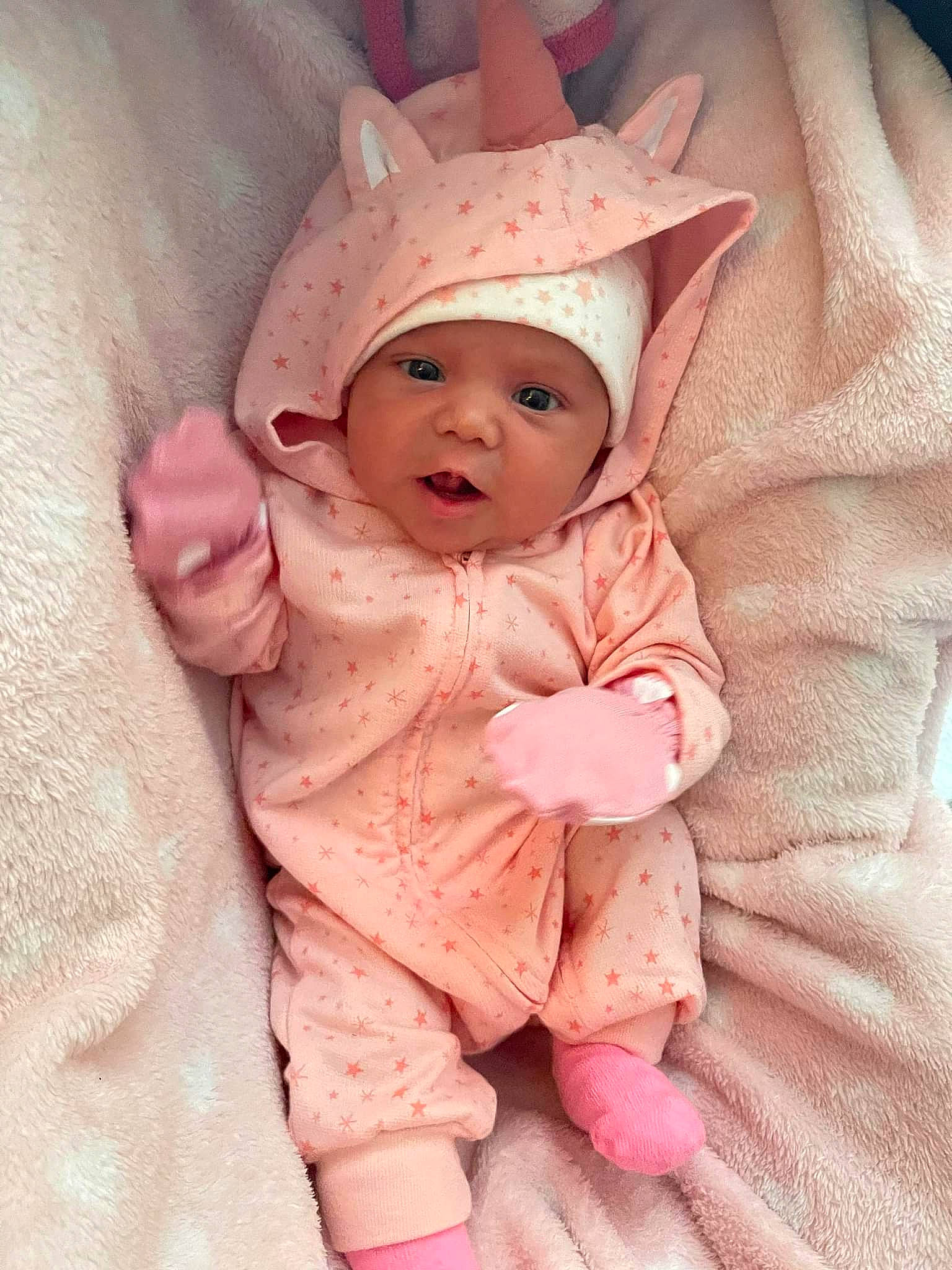 Journie joined the competition — help win amazing prizes! baby, baby_toddler_clothing, cap, cheek, comfort, fashion_accessory, gesture, happy, headwear, human_body, linens, lip, magenta, nose, outerwear, peach, person, pink, skin, sleeve