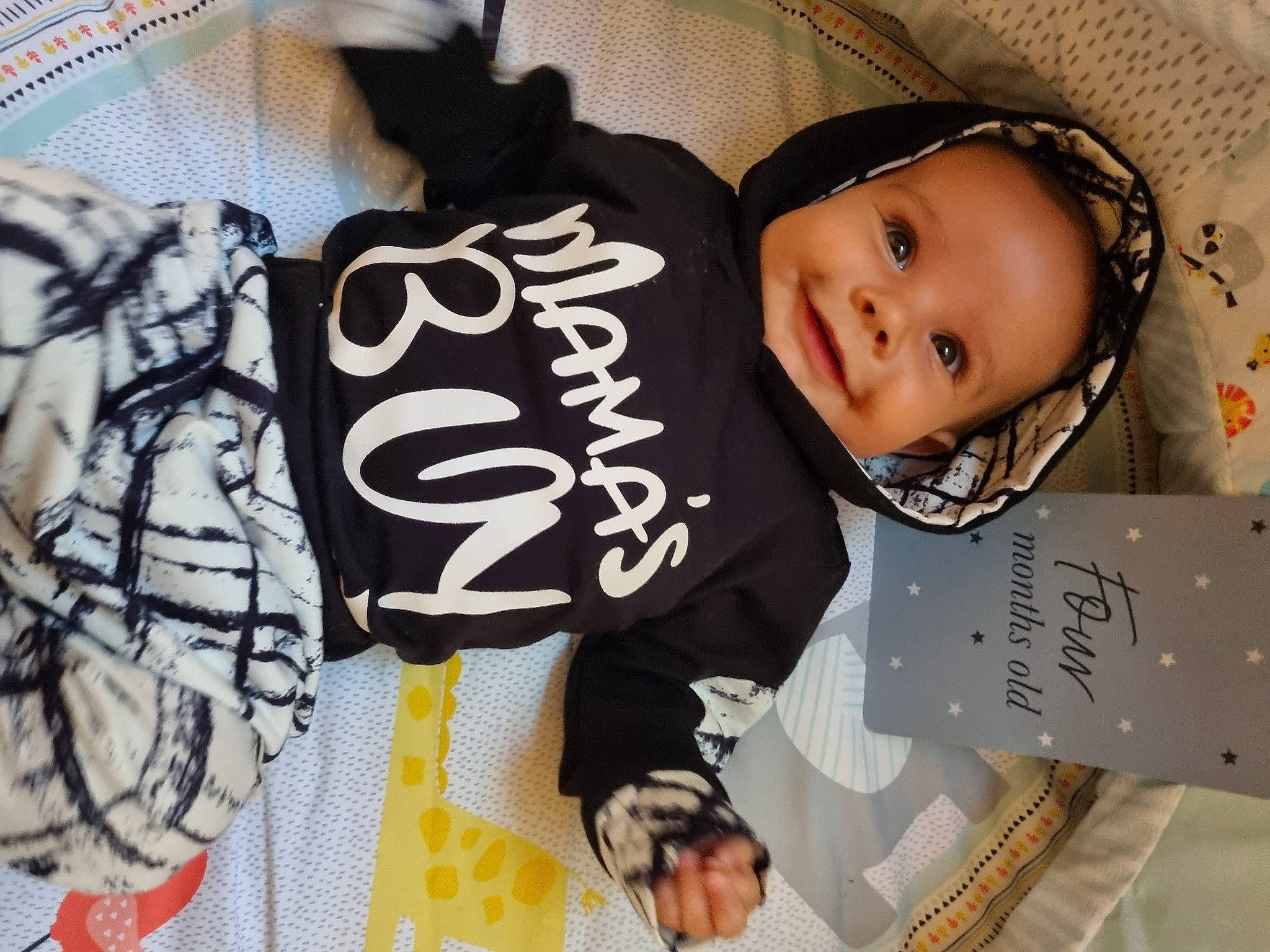 Malakai joined the competition — help win amazing prizes! baby, baby_toddler_clothing, carmine, child, comfort, fashion_accessory, font, happy, joy, pattern, person, sleeve, smile, toddler, visual_arts