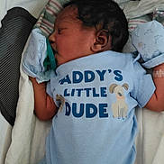 Saadiq joined the competition — help win amazing prizes! newborn, baby, sleeping, onesie, pacifier, mittens, blanket, infant, clothing, closeup, cute, resting, child, portrait, indoors, soft, peaceful, head, face, skin