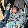 Saadiq joined the competition — help win amazing prizes! baby, blanket, car_seat, child, clothing, cozy, cute, hood, indoor, infant, nap, pacifier, peaceful, person, relaxing, resting, seat, sleeping, socks, toddler