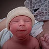 newborn, baby, infant, sleeping, hat, knit_hat, towel, blanket, skin, closeup, face, peaceful, hospital, gown, hand, portrait, fresh, resting, cute, child