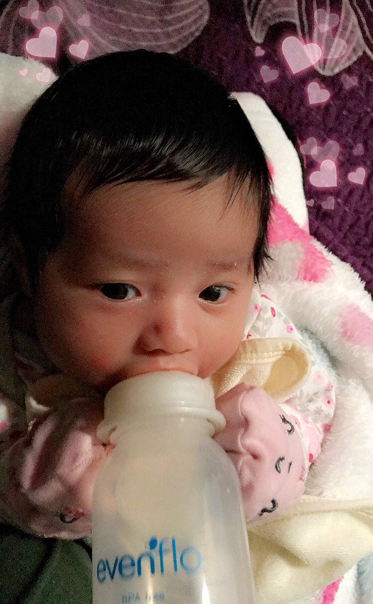 Ximena is registered to the contest to win money with this photo: black_hair, cheek, child, ear, eye, face, forehead, girl, hand, head, infant, iris, mouth, nose, person, pink, product, skin, toddler