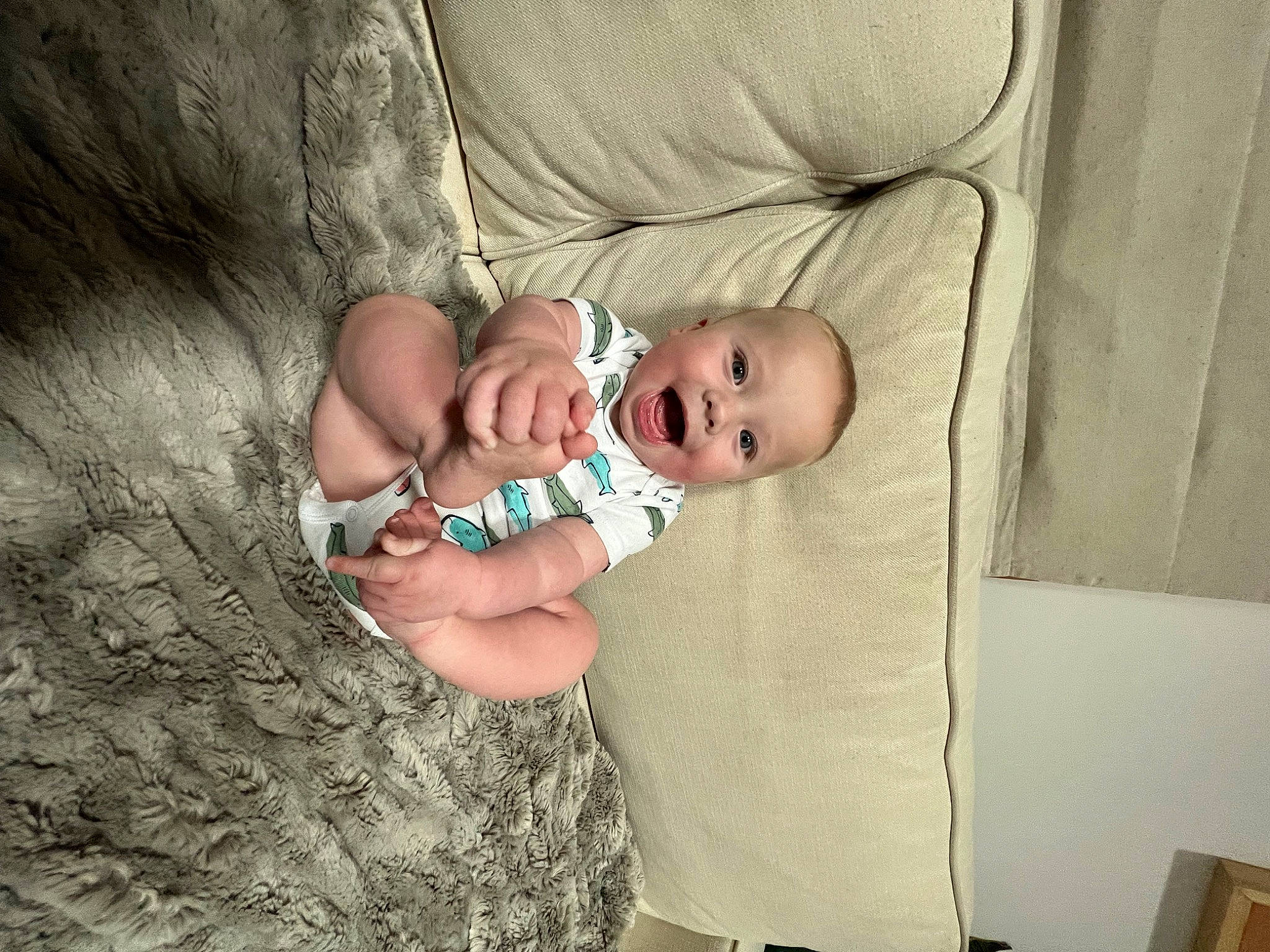 Julian joined the competition — help win amazing prizes! baby, baby_products, baby_toddler_clothing, cheek, child, comfort, eye, face, finger, flash_photography, grass, hand, head, human_body, iris, linens, person, room, sitting, toddler