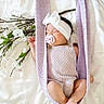 baby, sleeping, pacifier, headband, bow, knit, lavender, hammock, flower, white, soft, cute, infant, peaceful, cozy, portrait, newborn, blanket, delicate, resting