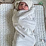 Joséphine participe au concours pour gagner de l'argent avec cette photo : baby, baby_accessories, blanket, child, comfort, cute, face, hood, indoors, infant, lying_down, mat, newborn, pacifier, patterned, resting, soft, towel, white, wrapped
