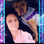 woman, dog, selfie, indoor, purple_jacket, pink_clothing, pet, portrait, face, smile, dark_background, neon_border, casual, friendship, animal, cute, companion, people, closeup, indoor_lighting