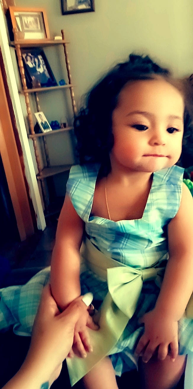 Bronx is registered to the contest to win money with this photo: black_hair, blue, cool, elbow, eye, eyelash, face, flash_photography, hair, hairstyle, happy, lip, neck, person, picture_frame, shelf, shoulder, skin, smile, thigh