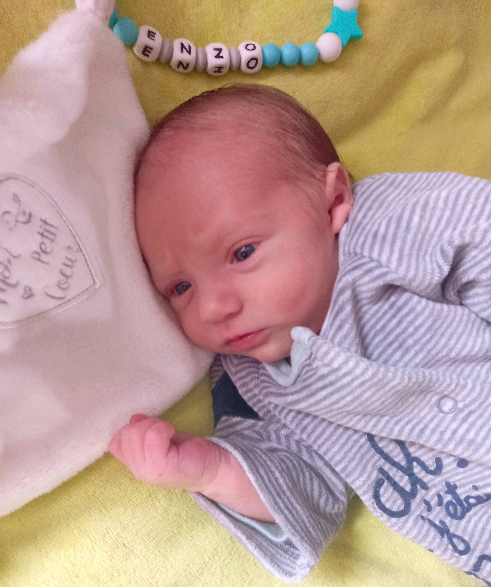 Enzo a rejoint le concours — aidez-le/la à gagner de superbes lots ! baby, baby_products, baby_sleeping, baby_toddler_clothing, bedtime, cheek, child, comfort, eye, finger, gesture, happy, iris, jewellery, linens, nose, person, pink, skin, smile