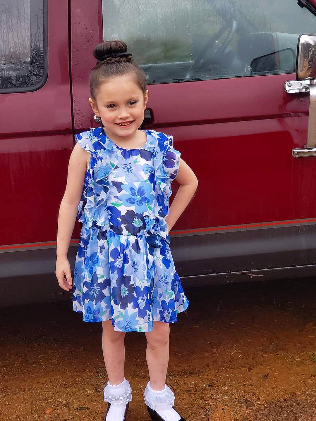 Julie is registered to the contest to win money with this photo: automotive_design, automotive_lighting, baby_toddler_clothing, day_dress, dress, electric_blue, facial_expression, fun, hairstyle, happy, joint, joy, magenta, motor_vehicle, one_piece_garment, person, pink, shoulder, standing, toddler