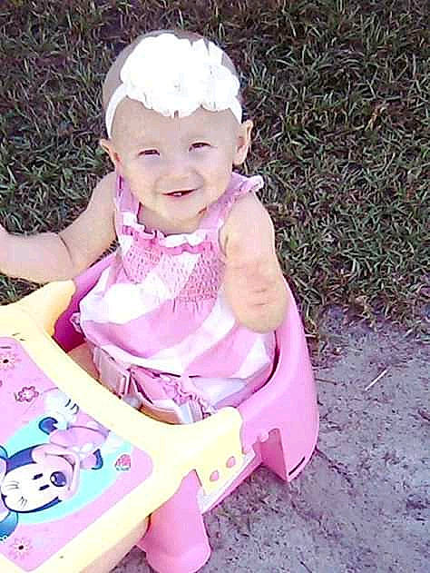 Karson Swearingen is registered to the contest to win money with this photo: baby, baby_products, baby_toddler_clothing, child, dress, hair_accessory, happy, headwear, joy, person, pink, play, product, sitting, skin, smile, toddler