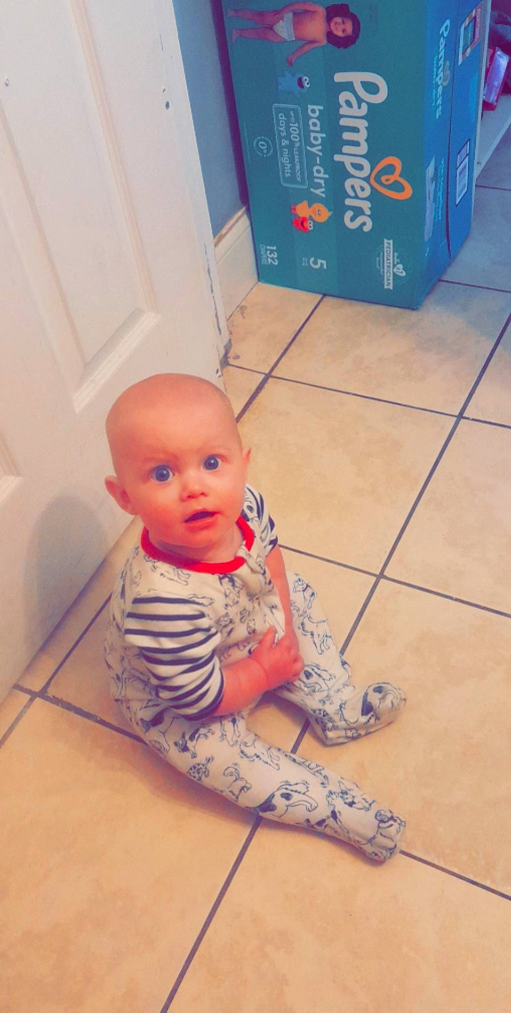 Ella joined the competition — help win amazing prizes! baby, baby_toddler_clothing, blurred, carmine, cheek, child, floor, flooring, foot, fun, gas, hardwood, headwear, human_leg, pattern, person, play, room, sitting, surprise