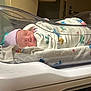newborn, baby, hospital, blanket, bassinet, sleeping, infant, hat, wrapped, bed, medical, person, nursery, peaceful, indoors, cute, healthcare, resting, child, newborn_baby