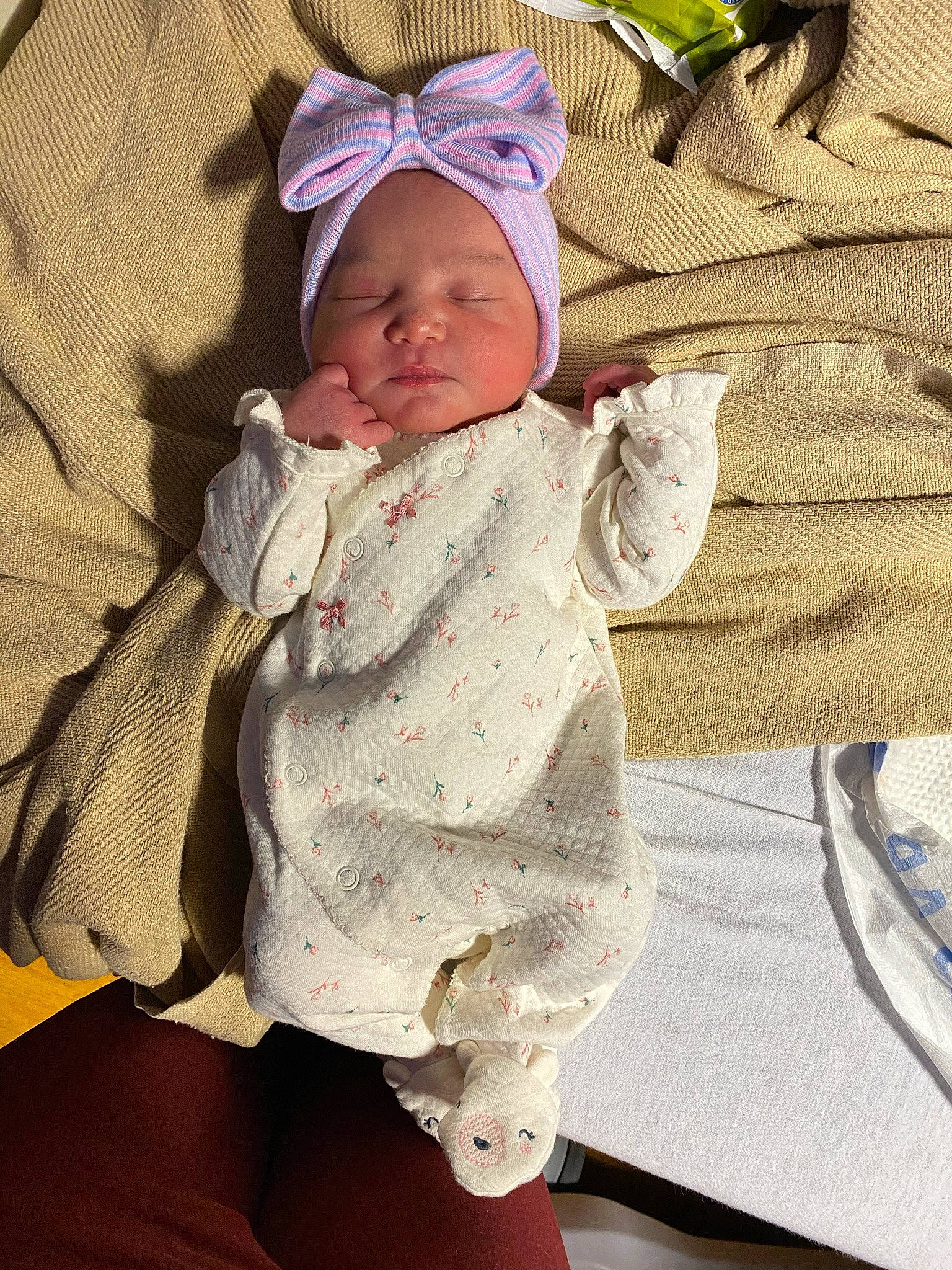 Ariya is registered to the contest to win money with this photo: baby, baby_products, baby_safety, baby_sleeping, baby_toddler_clothing, child, collar, comfort, hat, headwear, kitchen_utensil, linens, pattern, person, skin, sleeve, tableware, textile, toddler