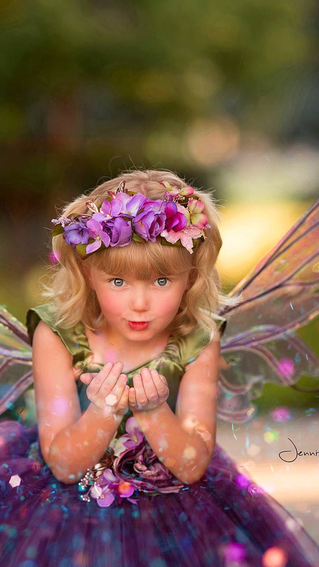 Raina is registered to the contest to win money with this photo: child, child_model, flower, flower_arranging, fun, girl, hair_accessory, happiness, headgear, headpiece, headwear, lavender, lilac, person, petal, pink, plant, portrait_photography, purple, smile
