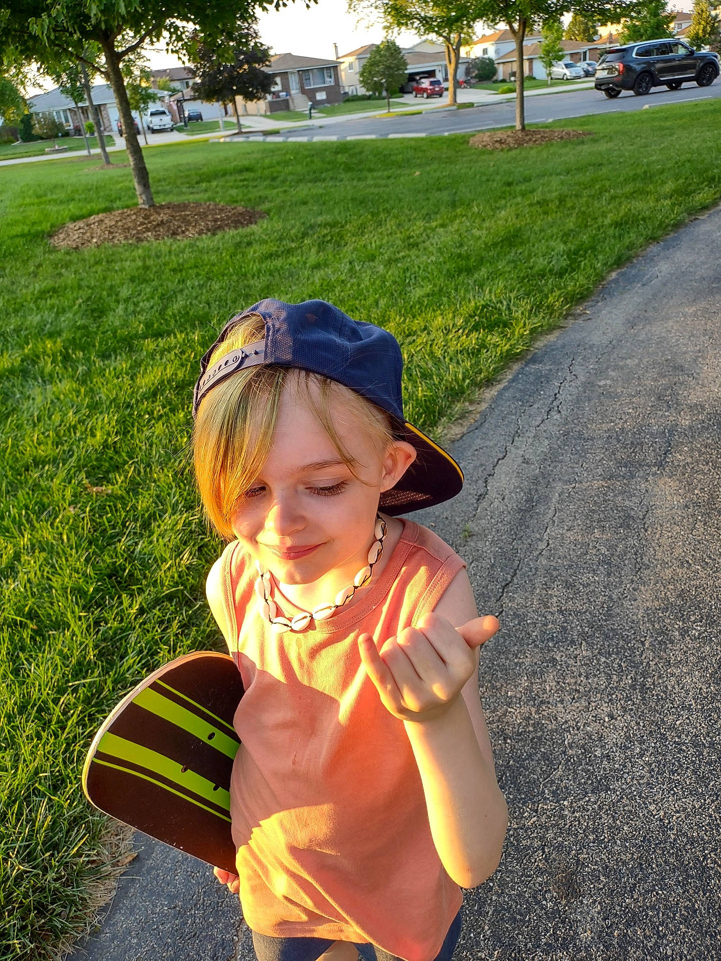 baseballcap, cap, city, clothing, face, grass, hat, head, nature, outdoors, park, path, person, photography, plant, portrait, road, sidewalk, street, urban