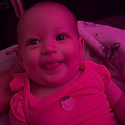 Genesis joined the competition — help win amazing prizes! baby, infant, tongue_out, pink_lighting, blanket, clothing, cute, smiling, portrait, child, indoors, soft_light, face, person, sitting, cozy, happy, young_child, head, eyes