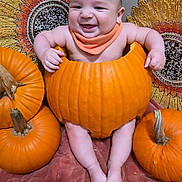 Marcello joined the competition — help win amazing prizes! baby, pumpkin, smiling, orange, cute, autumn, fall, holiday, child, seasonal, decor, sitting, face, feet, blanket, background, happy, festive, headwear, indoors