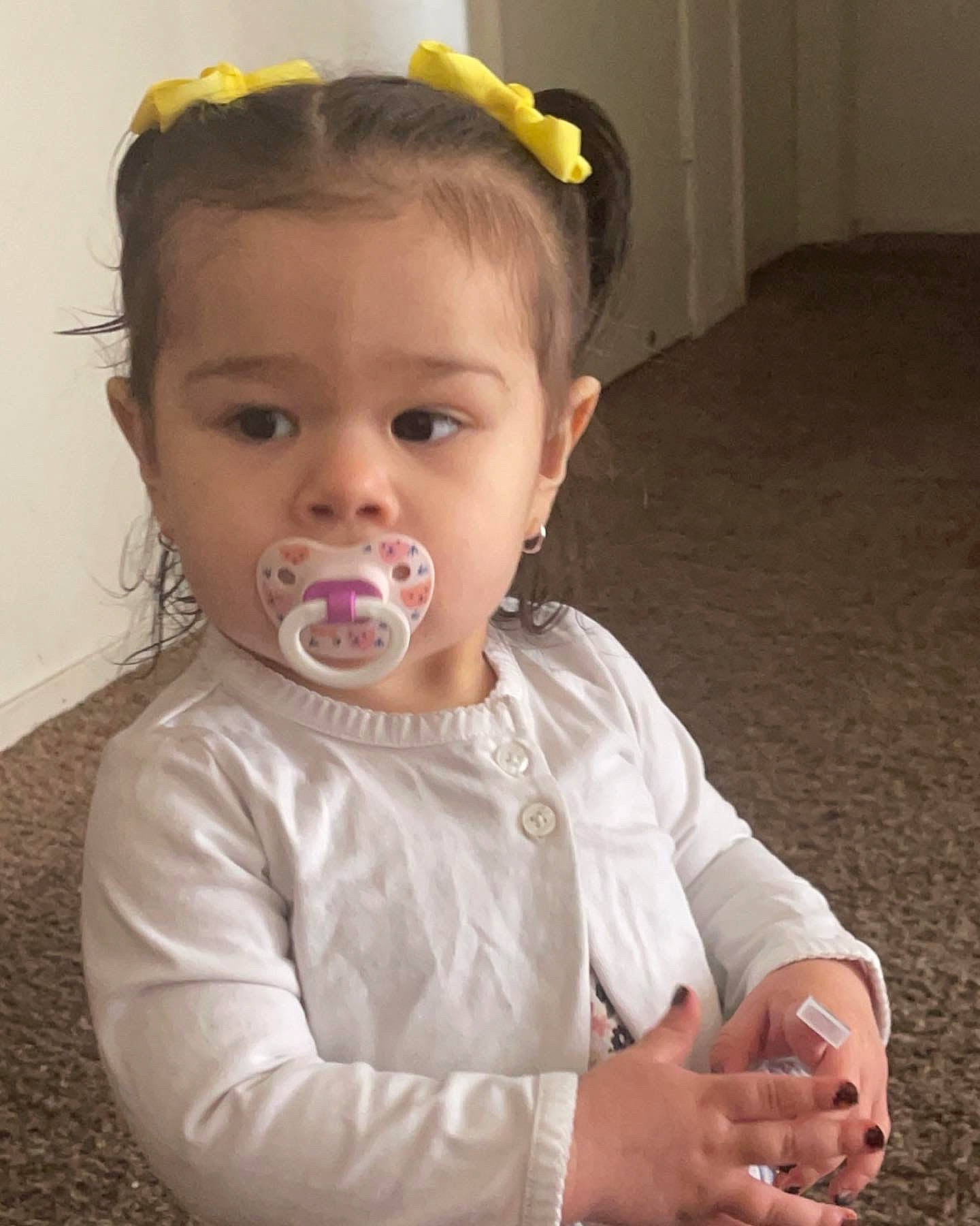 Elisa is registered to the contest to win money with this photo: baby, baby_toddler_clothing, cheek, chin, ear, eyebrow, eyelash, face, gesture, hair, happy, head, iris, lip, mouth, neck, nose, person, skin, sleeve