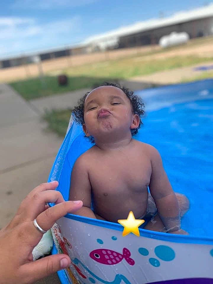 Jared is registered to the contest to win money with this photo: aqua, baby, baby_bathing, baby_products, barechested, bathing, blue, child, finger, fluid, fun, hand, holiday, leisure, nail, person, play, stomach, summer, toddler