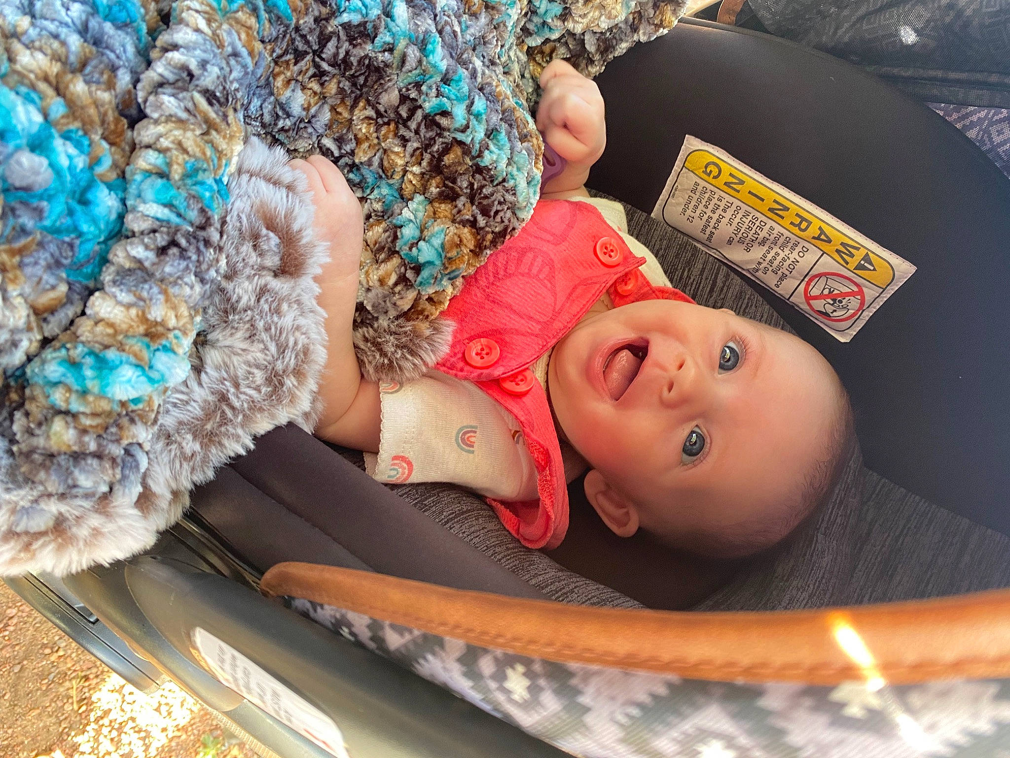 Kinzley is registered to the contest to win money with this photo: baby, baby_carriage, baby_products, baby_safety, baby_toddler_clothing, child, comfort, electric_blue, fashion_accessory, fur, headgear, infant_bed, linens, mammal, pattern, person, room, textile, toddler, vertebrate
