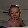 baby, toddler, bath, bathtub, bubbles, foam, smile, happy, child, water, skin, face, head, indoor, tile, cute, fun, playful, young, person