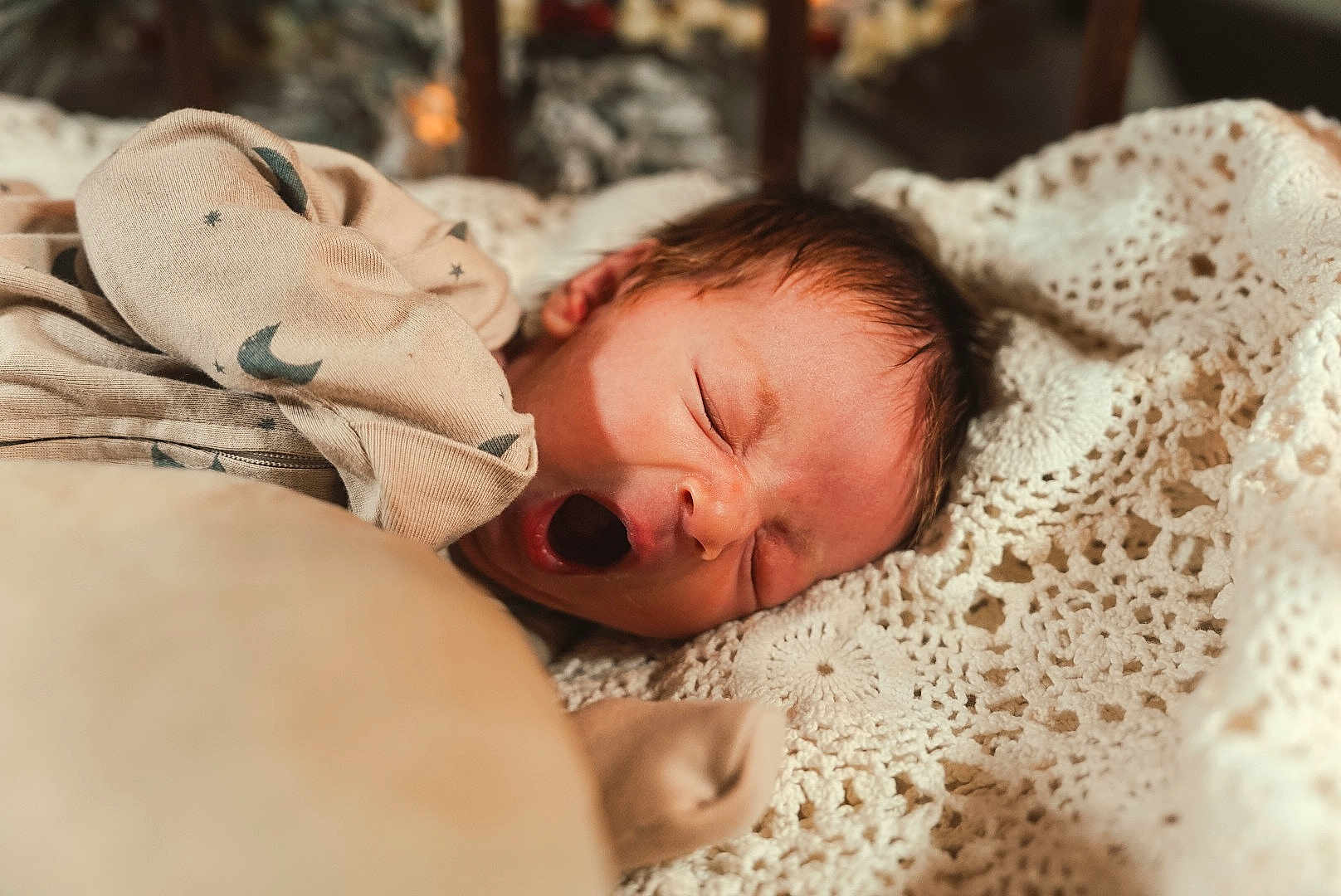 Eric joined the competition — help win amazing prizes! newborn, baby, sleeping, yawning, blanket, crochet, onesie, infant, cozy, soft, bed, cute, face, head, mouth_open, resting, indoor, child, peaceful, clothing
