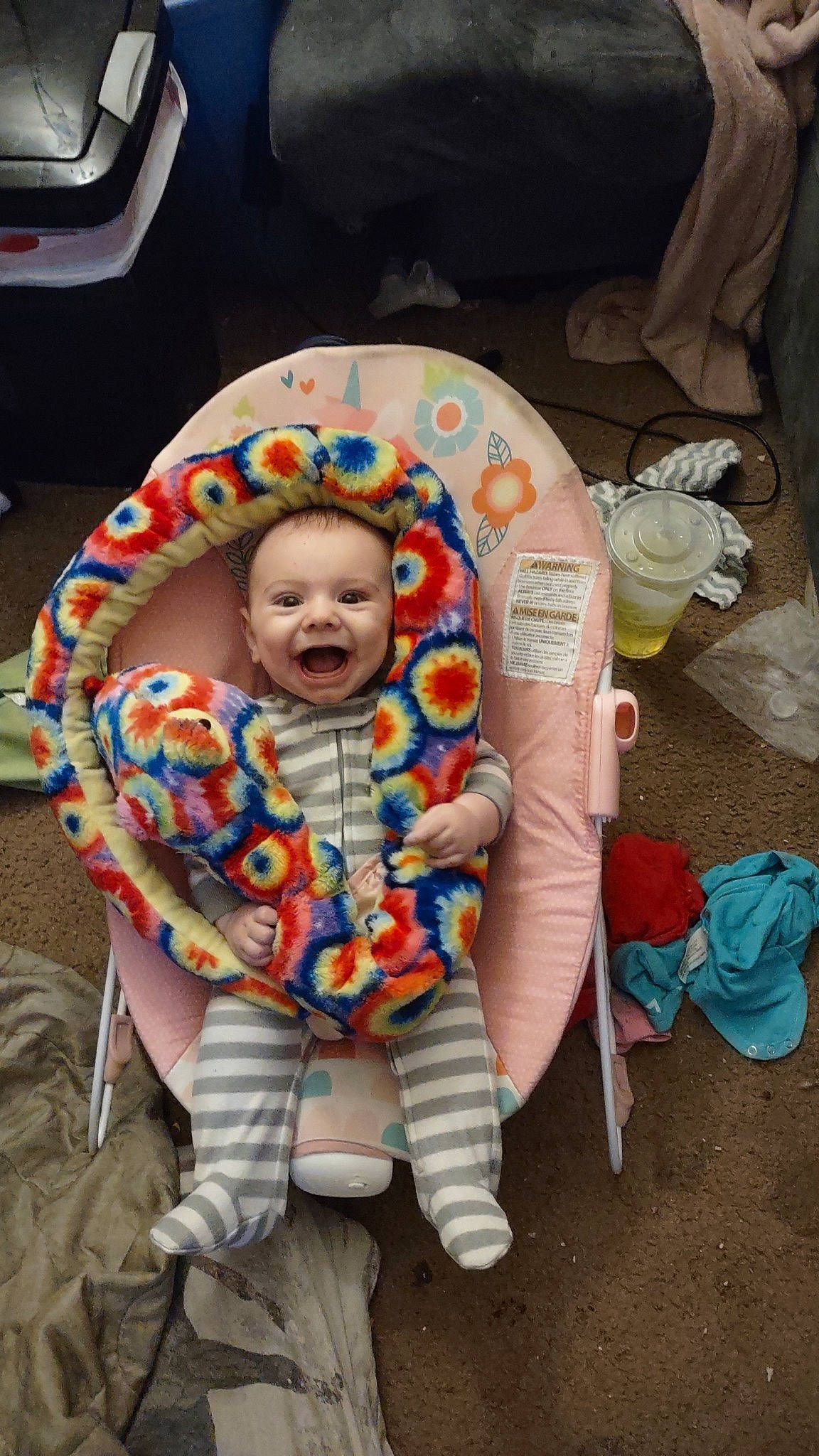 Cain is registered to the contest to win money with this photo: baby, baby_products, baby_toddler_clothing, baby_toys, chair, child, comfort, fun, happy, head, headgear, linens, pattern, person, personal_protective_equipment, plastic_bag, play, sitting, smile, toddler