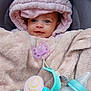 Mélodie participe au concours pour gagner de l'argent avec cette photo : baby, infant, blanket, hood, pacifier, bottle, toy, smile, face, closeup, cute, warm, clothing, child, soft, indoor, baby_bottle, baby_toy, comfort, portrait