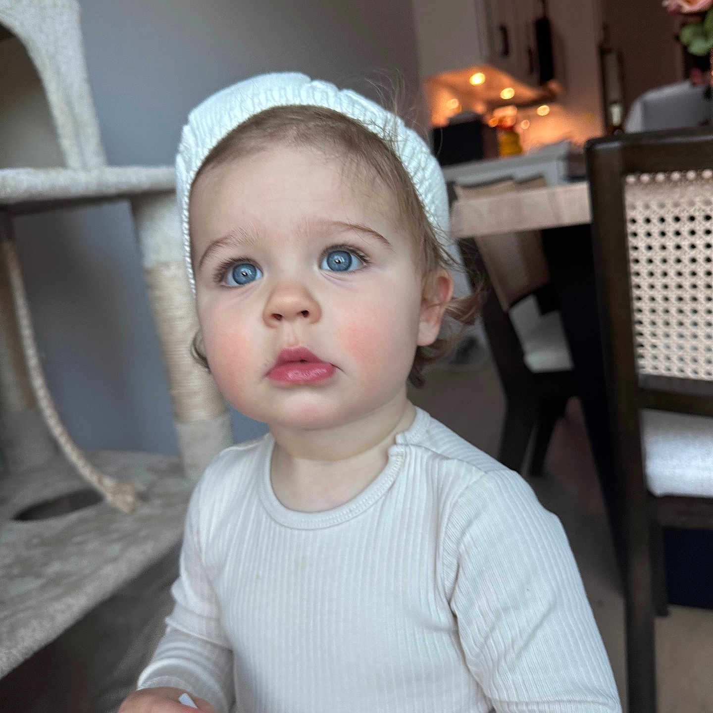 Monika is registered to the contest to win money with this photo: architecture, baby, bodypart, building, chair, clothing, diningtable, face, finger, furniture, hand, hat, head, indoors, livingroom, person, photography, portrait, room, table