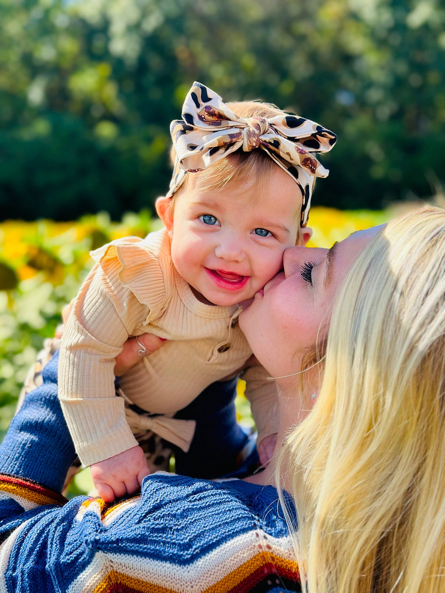 Kayleigh is registered to the contest to win money with this photo: baby, blond, child, event, fashion_accessory, flash_photography, fun, gesture, grass, happy, headband, headpiece, headwear, jewellery, joy, leisure, people_in_nature, person, plant, recreation