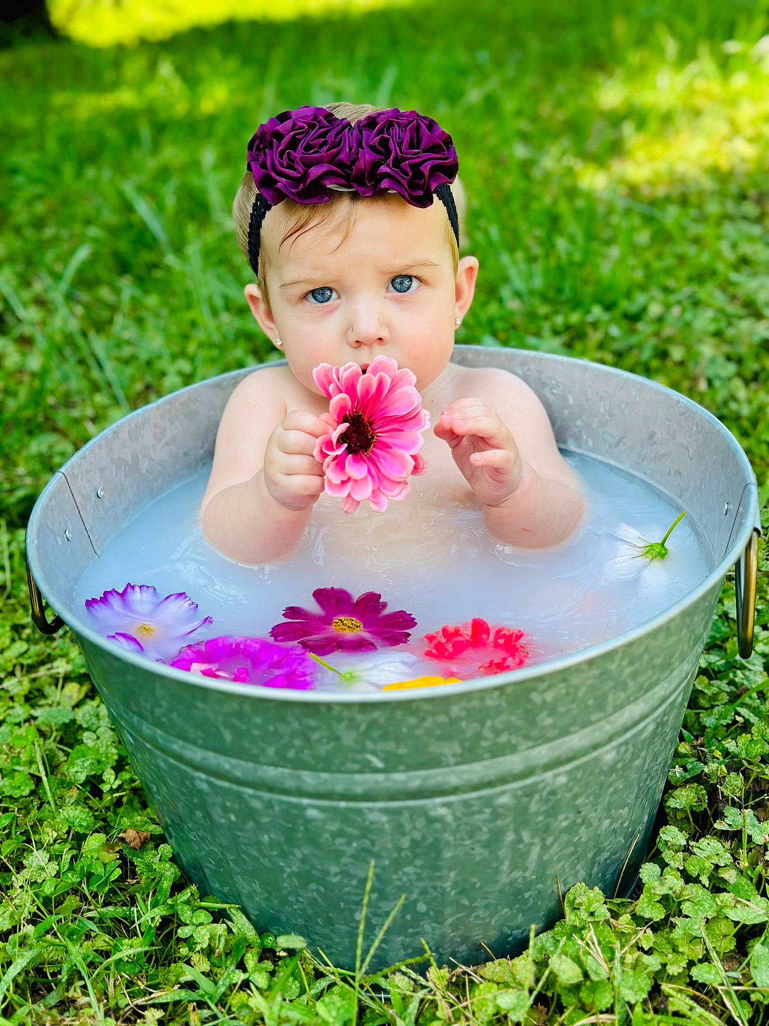 Kayleigh joined the competition — help win amazing prizes! annual_plant, botany, flower, fun, garden, grass, green, hair, happy, headwear, leisure, liquid_bubble, magenta, people_in_nature, person, petal, pink, plant, rose_family, toddler