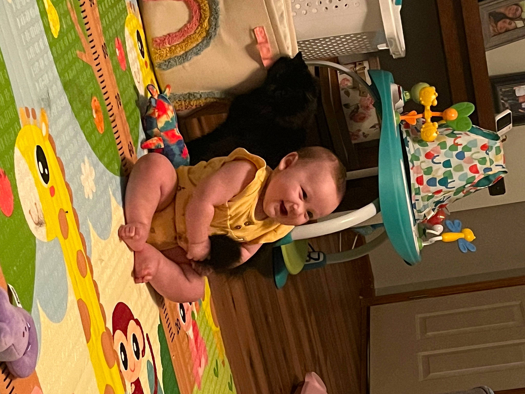 Remington is registered to the contest to win money with this photo: art, baby, baby_products, baby_toddler_clothing, baby_toys, child, fun, happy, leisure, pattern, person, play, room, textile, toddler, visual_arts, wood