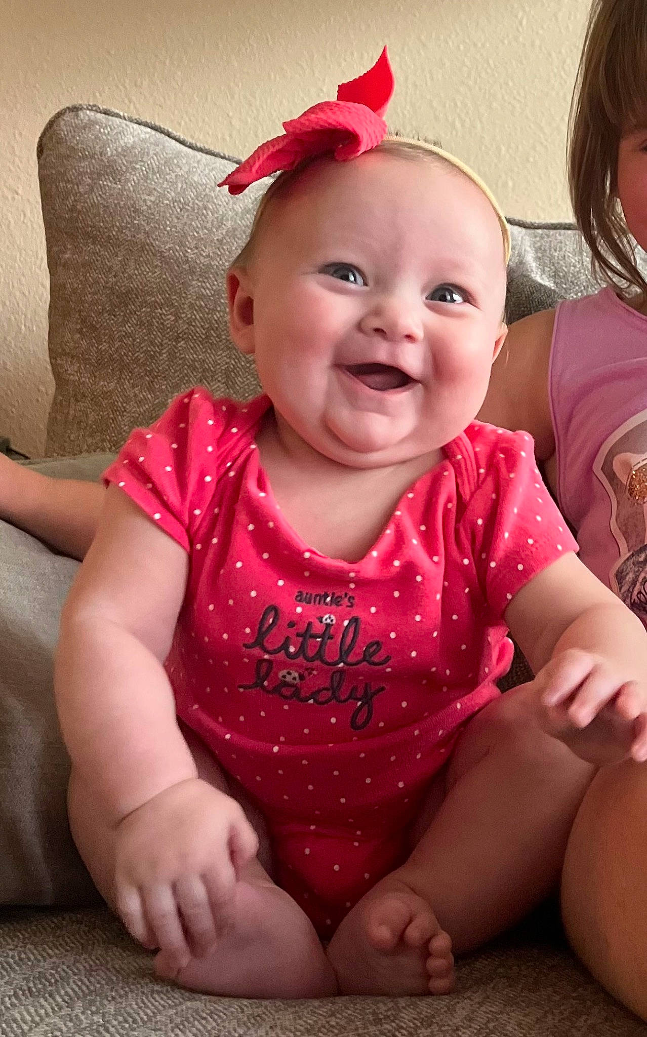 Remington joined the competition — help win amazing prizes! baby, baby_toddler_clothing, cheek, child, chin, dress, eye, face, happy, head, human_body, iris, joy, lip, magenta, person, pink, red, skin, sleeve