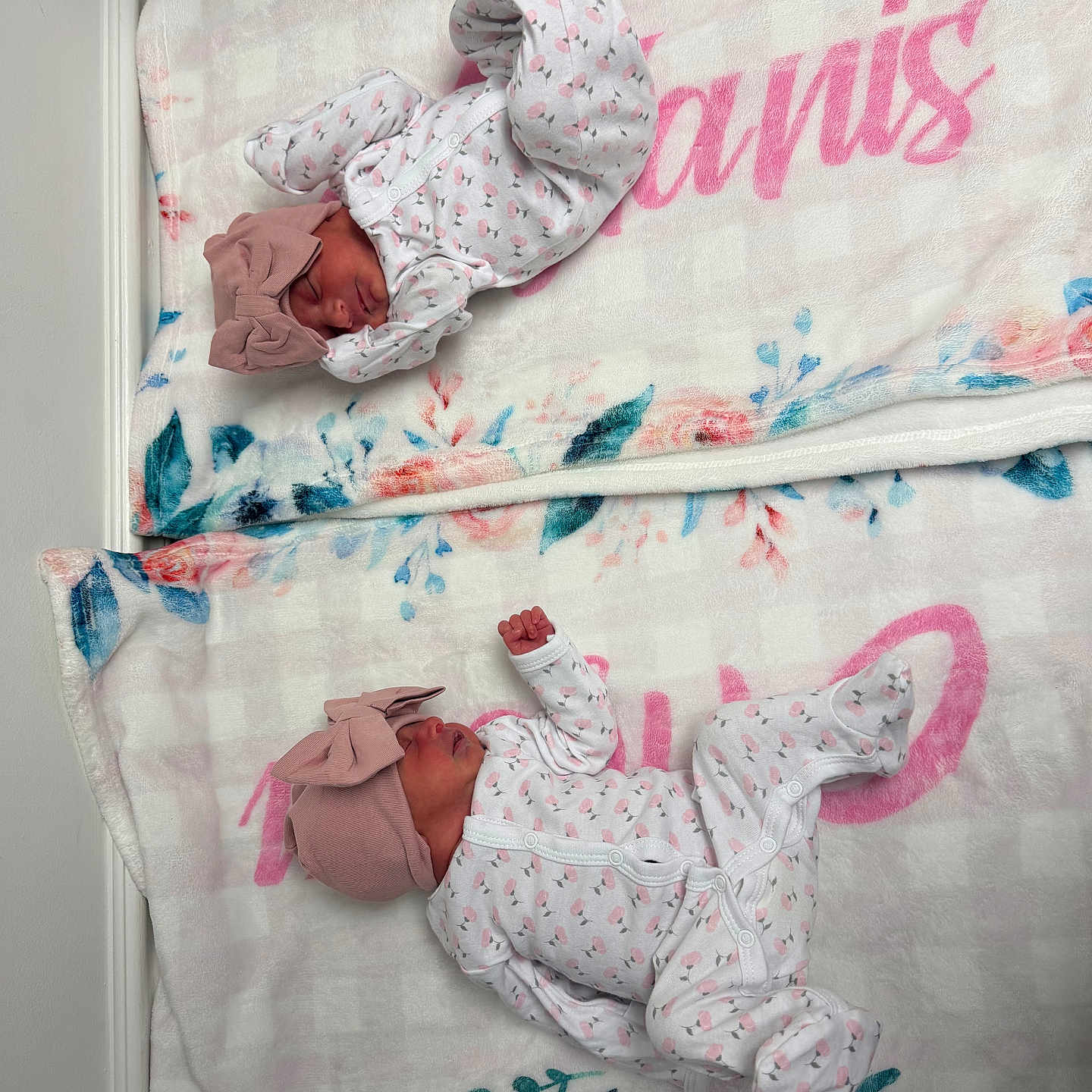 Allisson Y Aylanis is registered to the contest to win money with this photo: baby, blanket, bow, child, clothing, cozy, cute, floral_pattern, headwear, indoors, infant, lying_down, newborn, peaceful, person, pink, sleeping, soft, twin, white