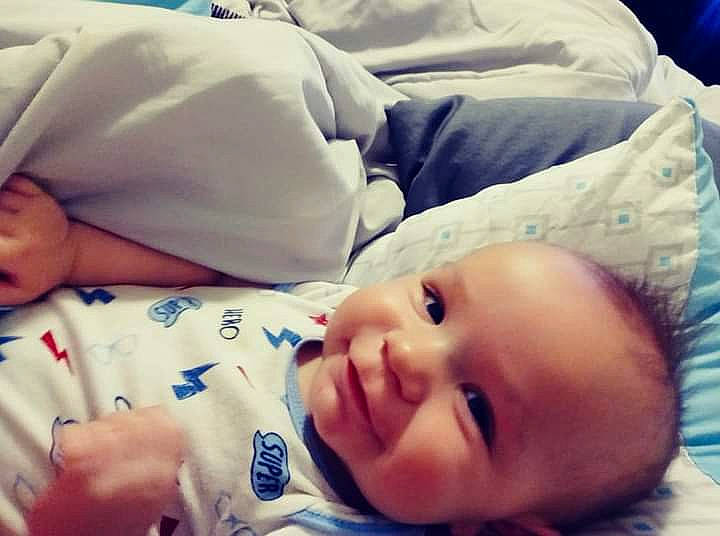 Rayden is registered to the contest to win money with this photo: baby, baby_toddler_clothing, cheek, cloud, comfort, eye, eyebrow, face, facial_expression, finger, happy, head, mouth, nose, person, photograph, product, skin, smile, textile