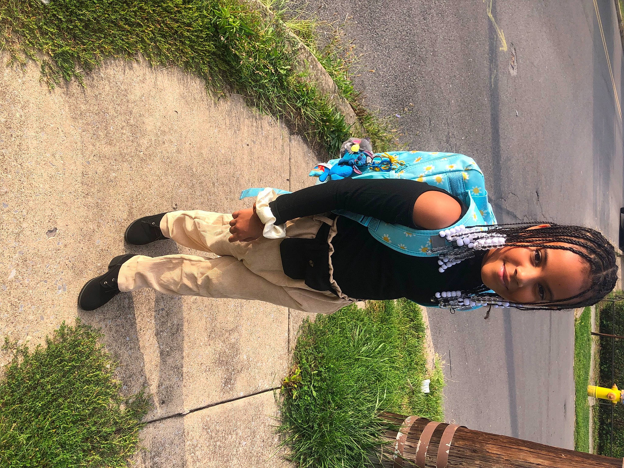 Jenavieve is registered to the contest to win money with this photo: electric_blue, fun, grass, happy, joy, landscape, leisure, people_in_nature, person, plant, recreation, shadow, sidewalk, sneakers, soil, vacation, walking_shoe, wall