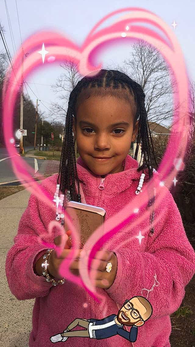 Jenavieve joined the competition — help win amazing prizes! child, face, facial_expression, fun, grass, hair, hairstyle, happy, head, joy, leisure, magenta, organ, person, pink, public_space, skin, sky, smile, swing