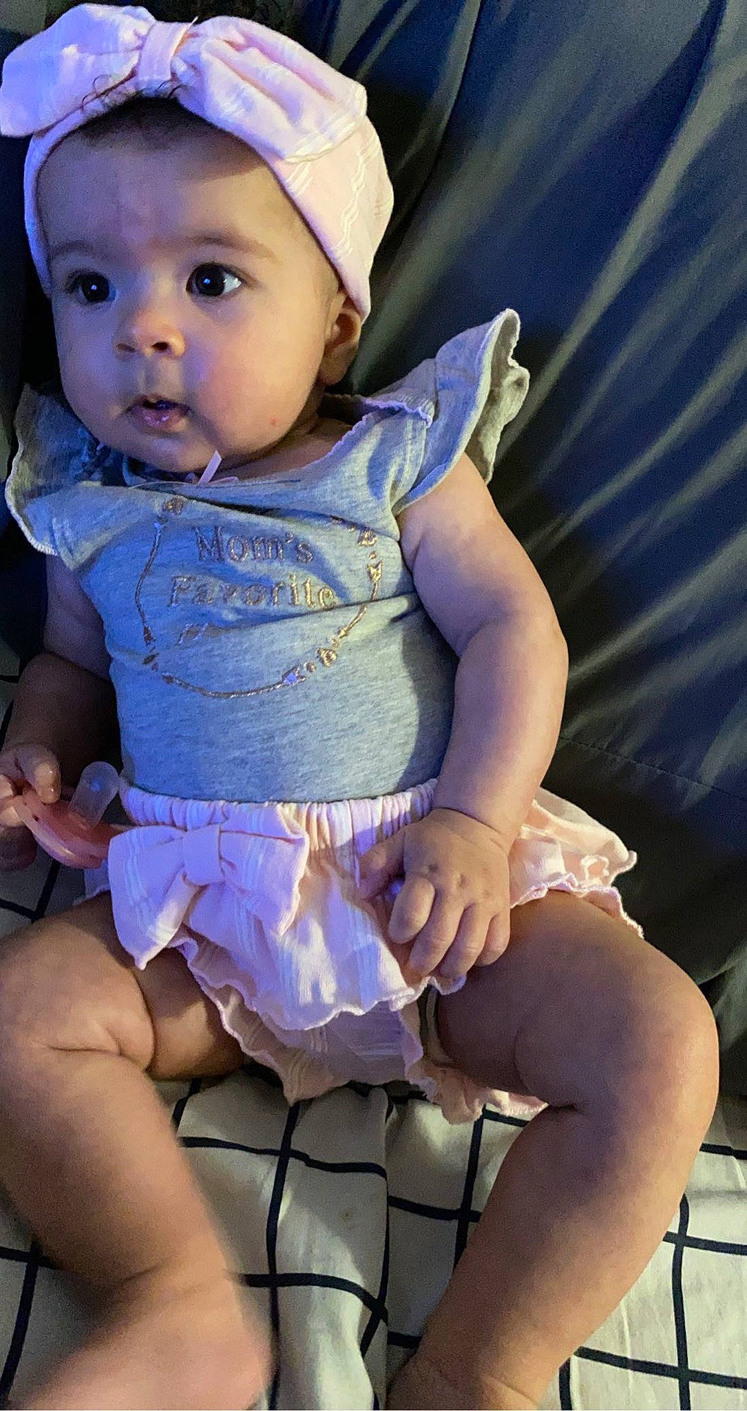 Aryah is registered to the contest to win money with this photo: azure, baby_toddler_clothing, blue, dress, face, hairstyle, headwear, human, human_body, iris, leg, lip, organ, person, pink, purple, skin, sleeve, textile, thigh