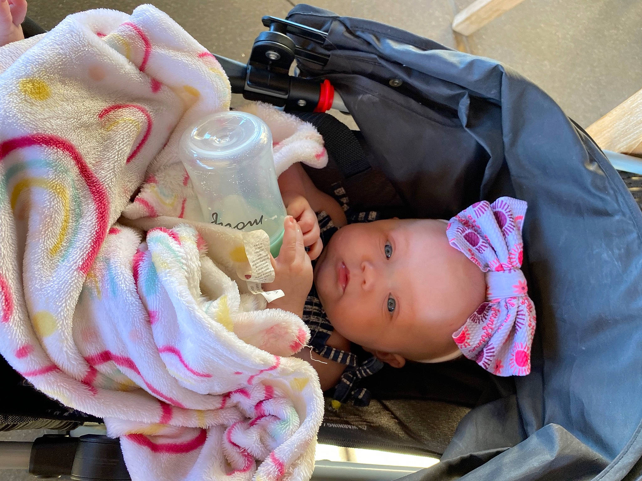 Bexleigh joined the competition — help win amazing prizes! baby, baby_carriage, baby_products, baby_safety, baby_toddler_clothing, carmine, cheek, child, comfort, event, eyelash, headwear, pattern, person, pink, sitting, skin, toddler, vacation