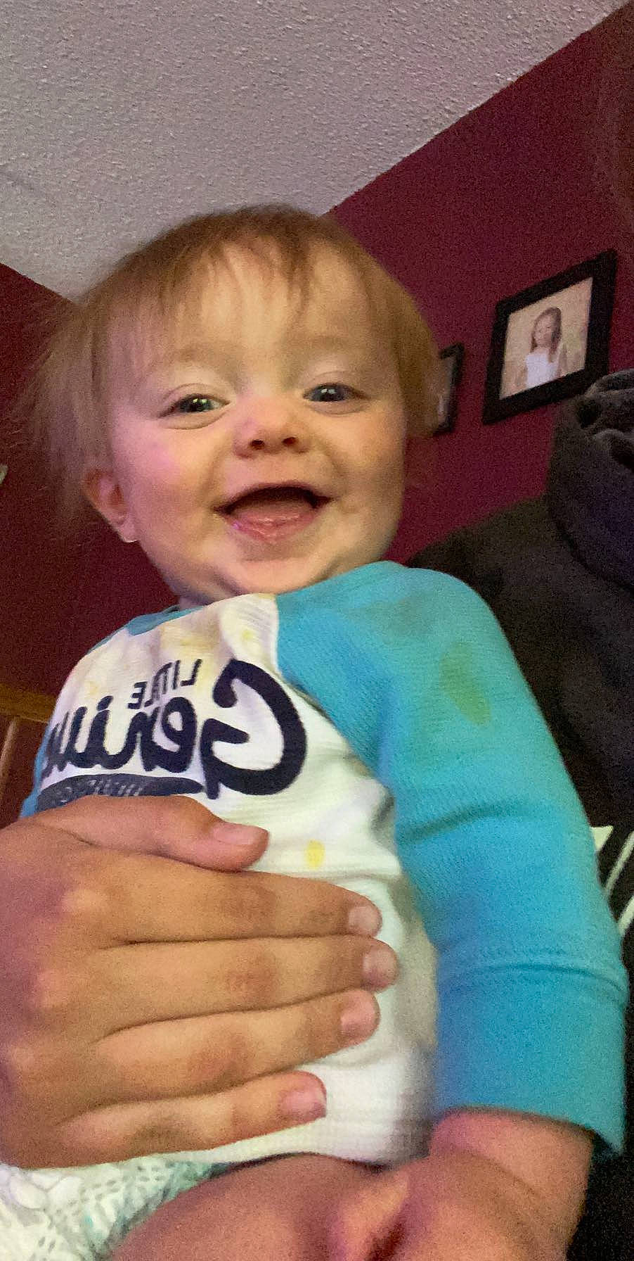 Kyren is registered to the contest to win money with this photo: baby, blurred, cheek, child, cool, face, facial_expression, finger, laugh, mouth, person, skin, smile, thumb, toddler