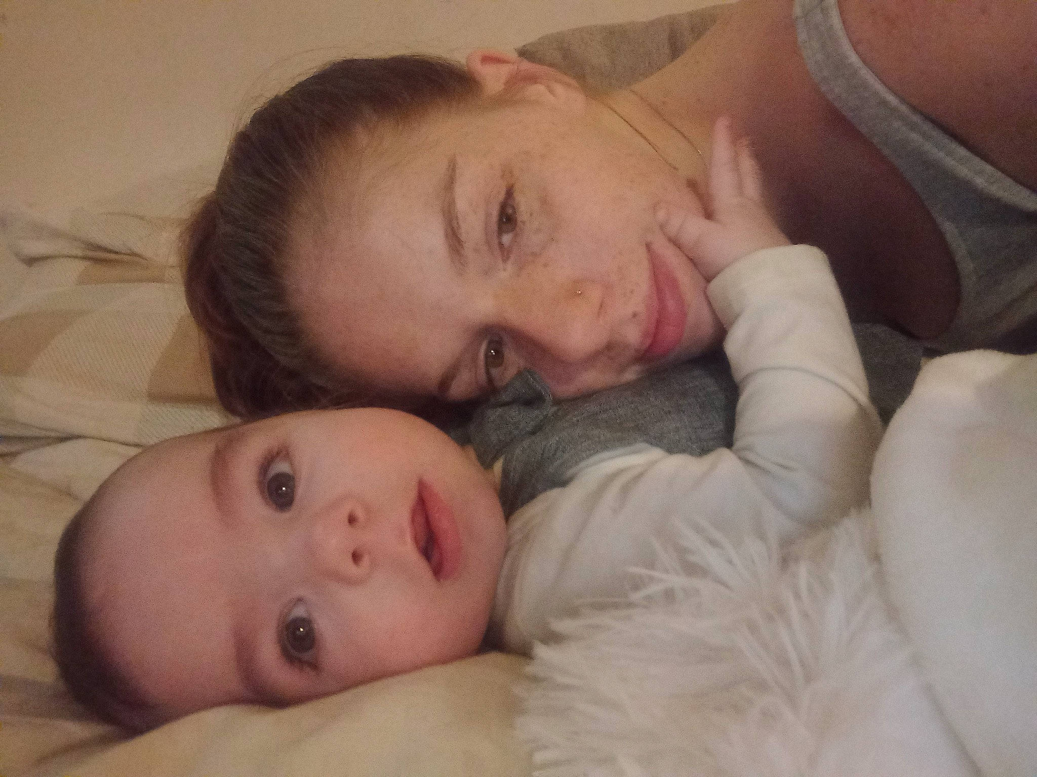 Harrison is registered to the contest to win money with this photo: cheek, child, chin, comfort, couch, ear, eyebrow, eyelash, face, fur, gesture, happy, iris, linens, lip, mouth, neck, nose, person, skin