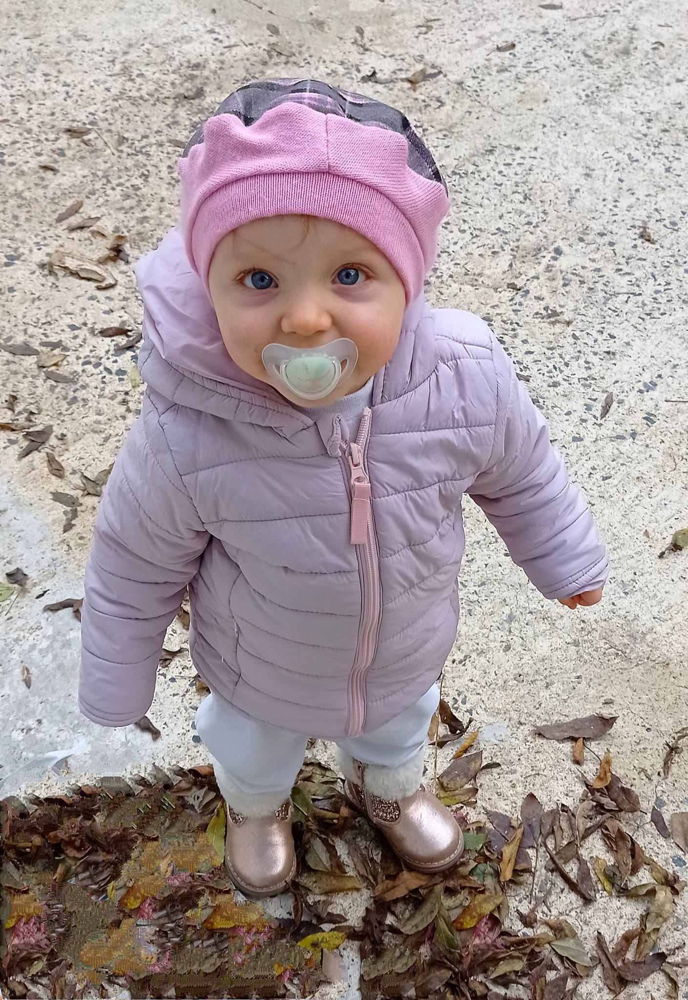 Hope participe au concours pour gagner de l'argent avec cette photo : baby, cheek, child, headwear, outerwear, person, pink, plant, smile, soil, toddler