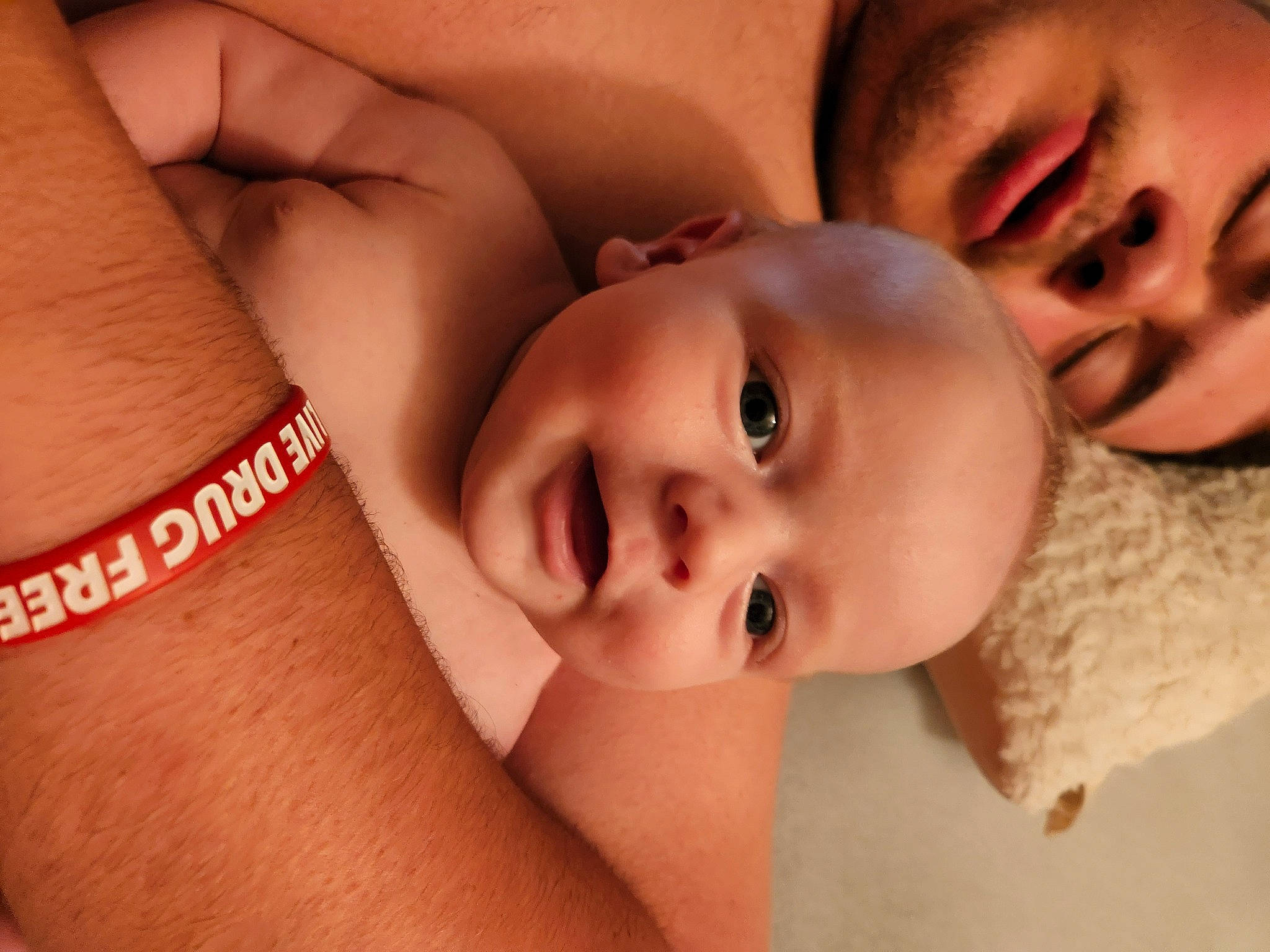 Julian is registered to the contest to win money with this photo: baby, cheek, chin, eye, eyebrow, eyelash, finger, flash_photography, gesture, happy, human_body, iris, lip, mouth, muscle, neck, nose, person, skin, smile