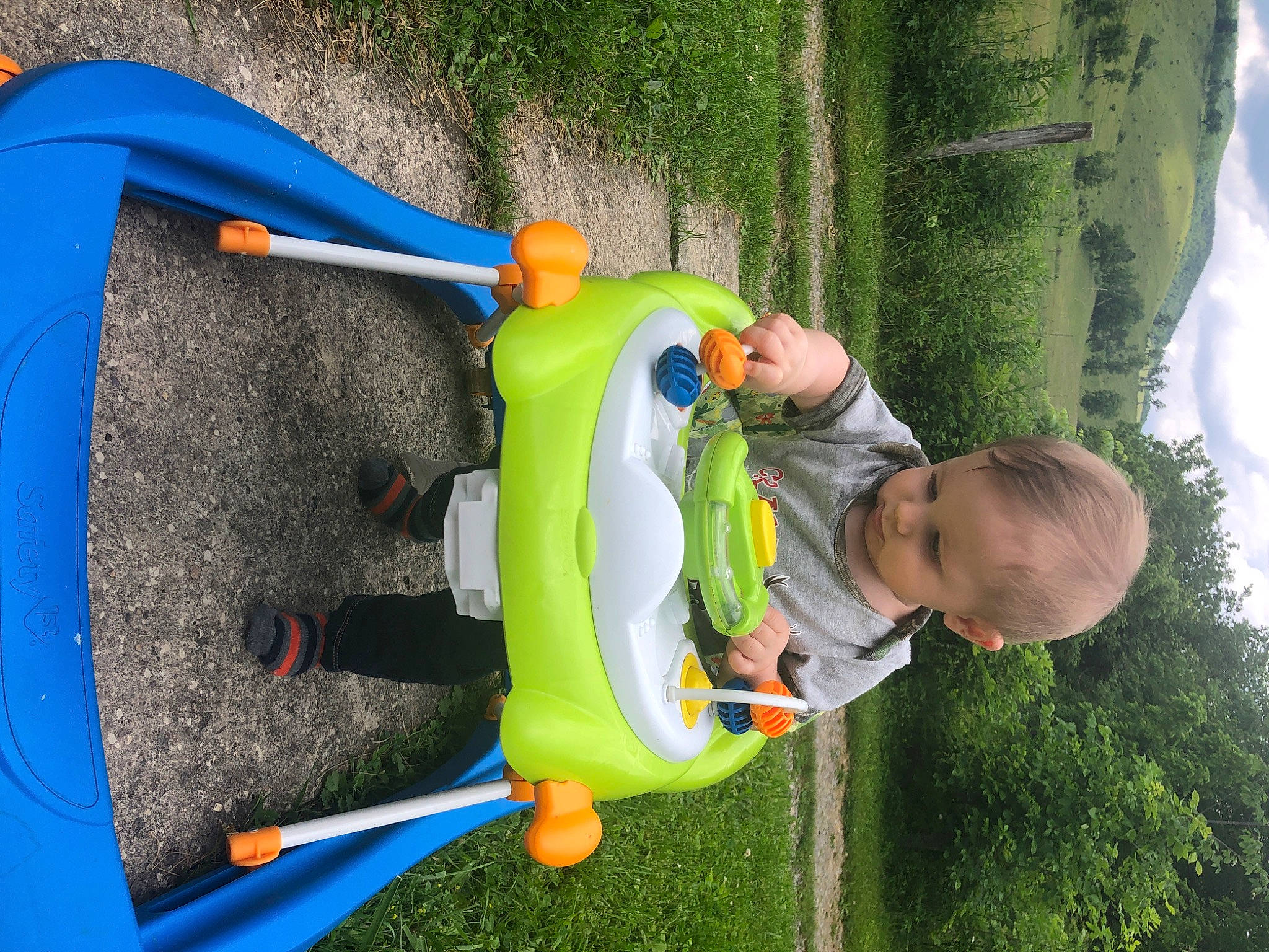 Ezra is registered to the contest to win money with this photo: child, fun, leisure, outdoor_play_equipment, person, play, toddler