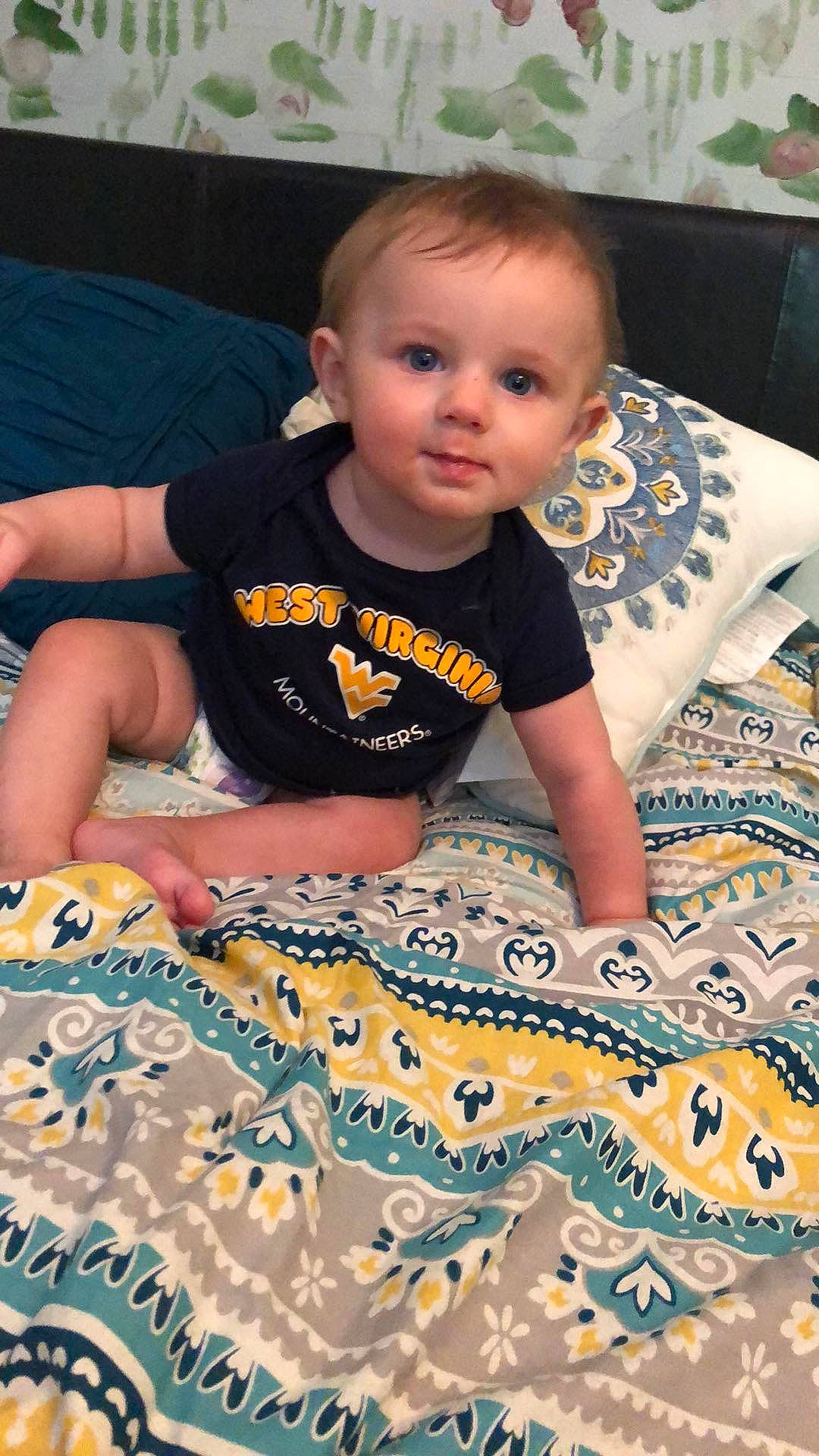 Ezra joined the competition — help win amazing prizes! baby, baby_toddler_clothing, blanket, child, fun, linens, person, play, quilt, sitting, t_shirt, textile, toddler