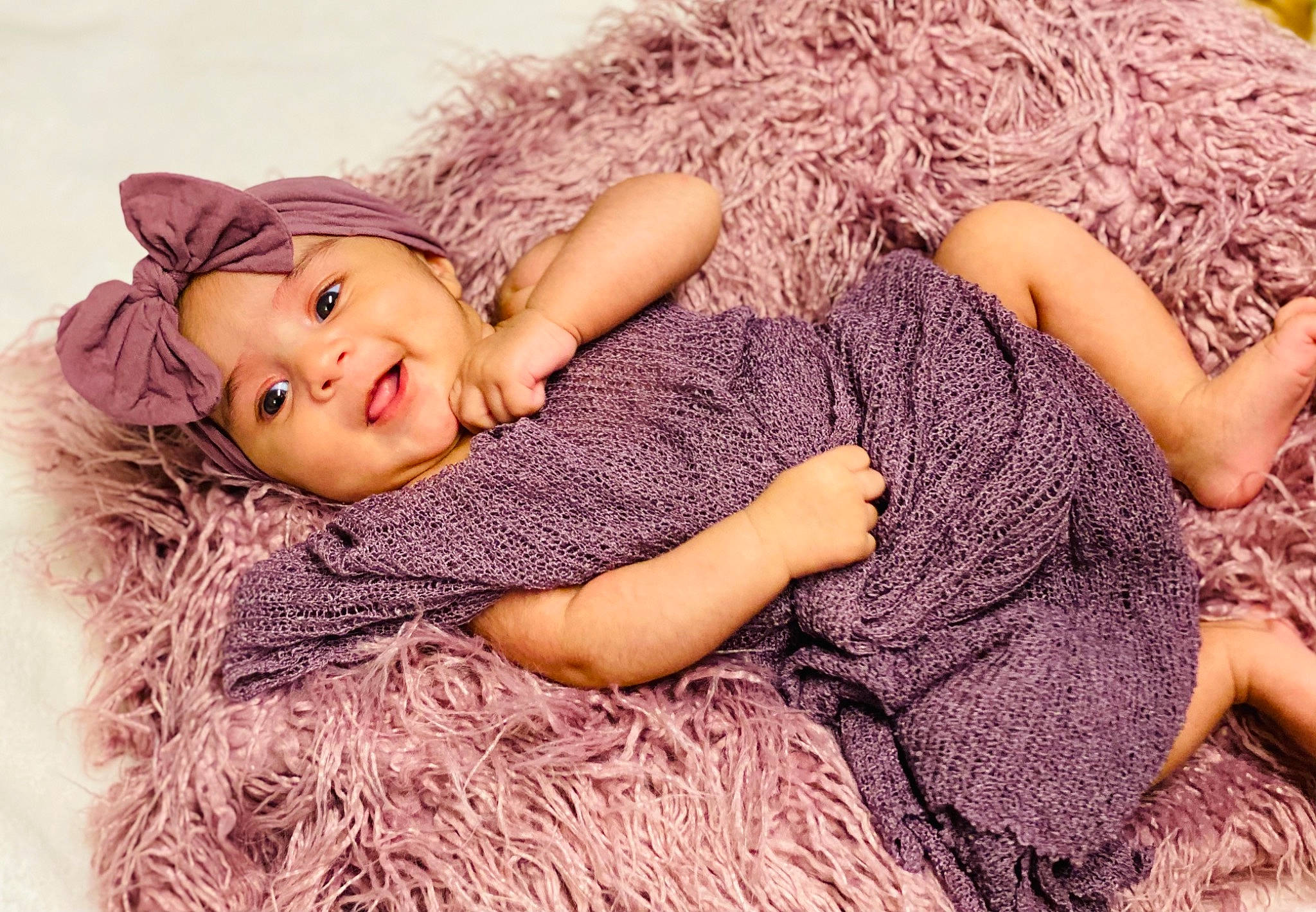 Inaya is registered to the contest to win money with this photo: baby, beauty, child, child_model, crochet, fawn, fur, headgear, headwear, knitting, lilac, person, photo_shoot, pink, purple, skin, sleep, toddler, wool